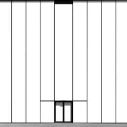 A stark white building façade with tall vertical panels separated by thin black lines, featuring a single black-framed door at the base.