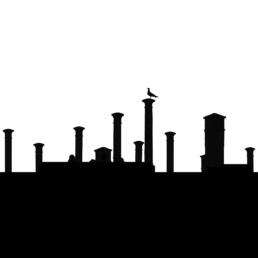Black silhouettes of chimneys and a bird perched on one, against a white sky.